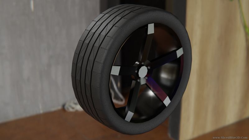 A black metallic rim and a tire